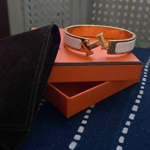 Hermes clic white and gold bangle bracelet